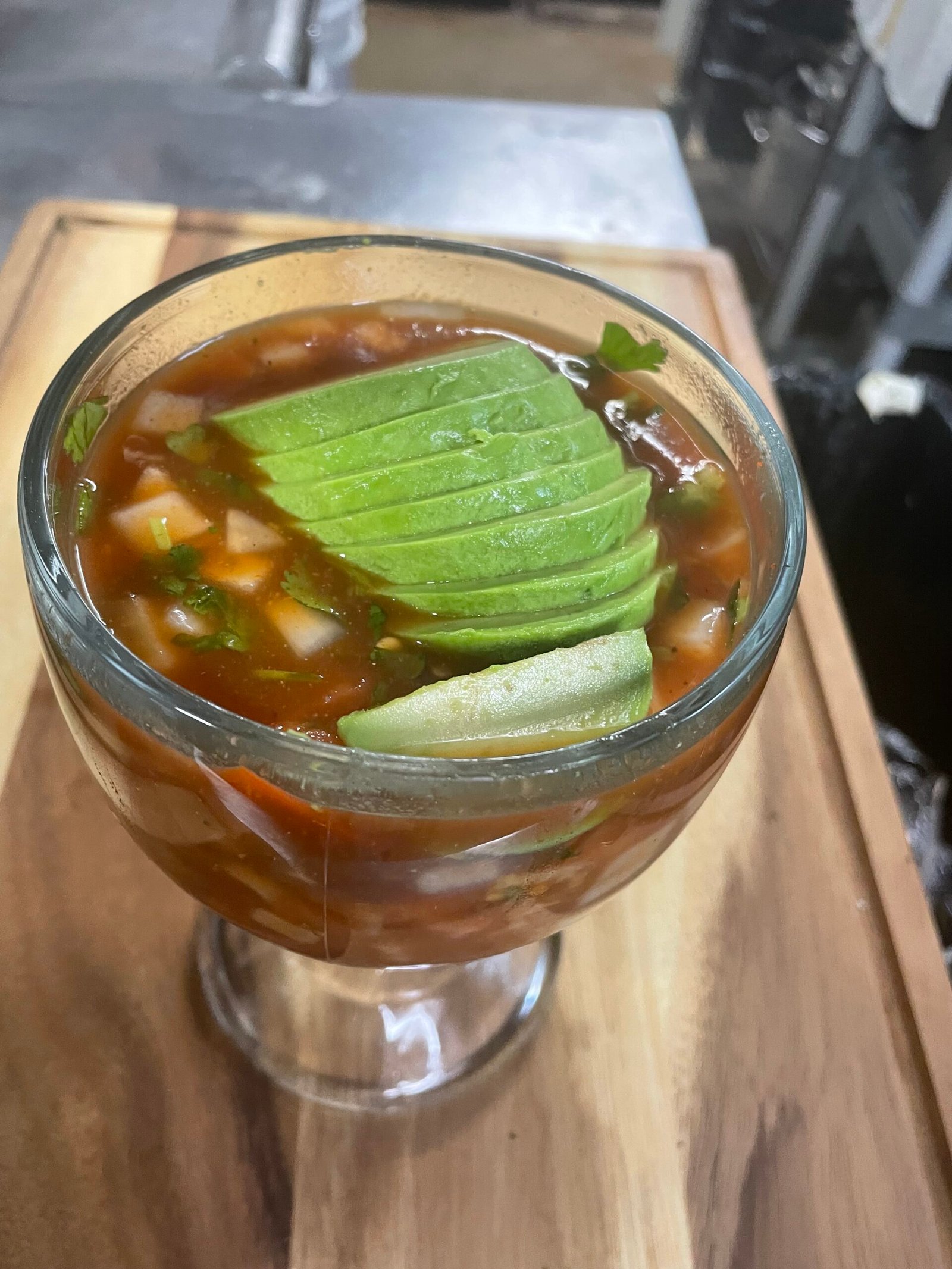 Mexican shrimp cocktail topped with avocado at Anita's Tex-Me